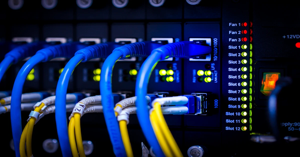 Enterprise network switch with blue and yellow fiber connections and status LEDs, illustrating Simultaneous Authentication of Equals (SAE) secure network access